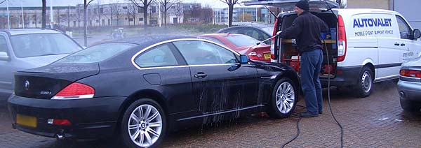 BMW 6 series receiving high pressure spray wash
